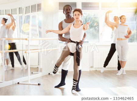Man and woman rehearsing a couple ballet dance together in studio 133462465