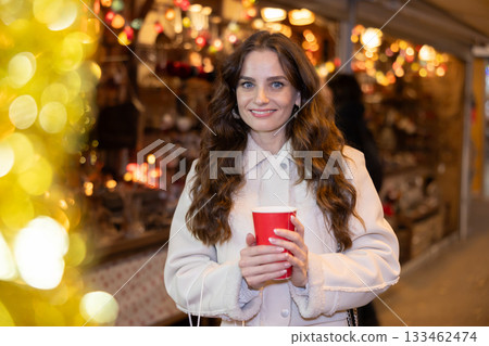Woman at Christmas market Woman at Christmas market 133462474