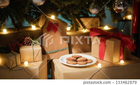 Santa Claus biscuits under Christmas tree 133462879