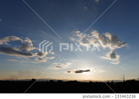 The sun hiding in the clouds 133463236