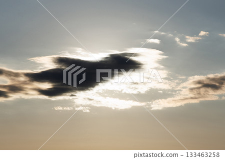 The sun hiding in the clouds The sun hiding in the clouds 133463258