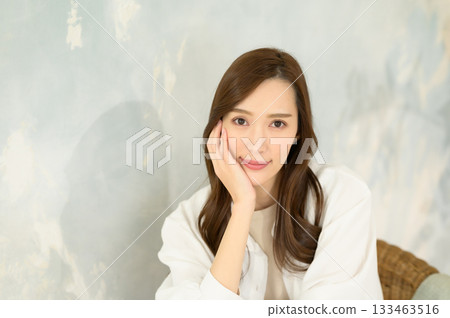 Woman putting hand on face Woman putting hand on face 133463516