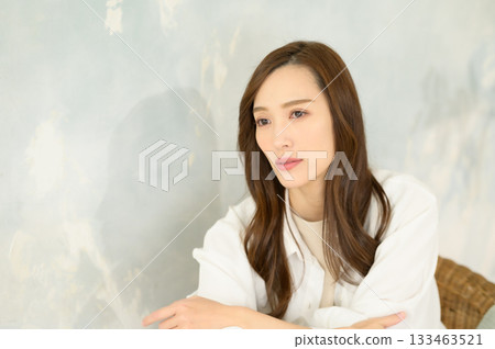 Woman putting hand on face Woman putting hand on face 133463521