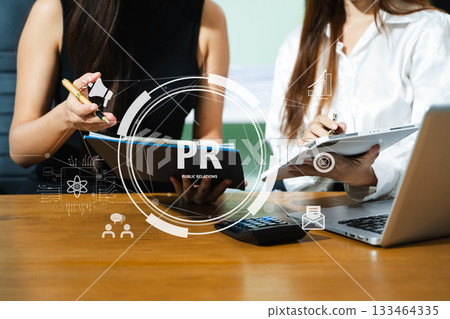 PR, Public relations concept. hands using laptop and tablet with public relations icon for communication advertising marketing strategy. with Ads and sales 133464335