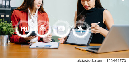 PR, Public relations concept. hands using laptop and tablet with public relations icon for communication advertising marketing strategy. with Ads and sales PR, Public relations concept. hands using laptop and tablet with public relations icon for communication advertising marketing strategy. with Ads and sales 133464770