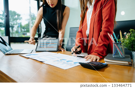 Business team meeting. professional investor working new start up project. Finance task. with smart phone and laptop and digital tablet Business team meeting. professional investor working new start up project. Finance task. with smart phone and laptop and digital tablet 133464771