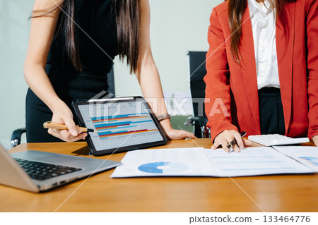 Business team meeting. professional investor working new start up project. Finance task. with smart phone and laptop and digital tablet 133464776