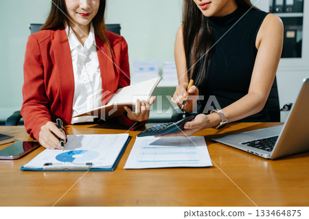 Business team meeting present.professional investor working with  Finance managers task. with laptop smart phone and digital tablet 133464875