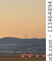 A landscape with an airplane 133464894