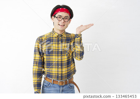 Akihabara-style man pointing to the right with palm on white background 133465453