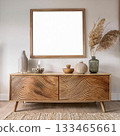 Wooden sideboard and blank picture frame Wooden furniture and poster mockup Wooden sideboard and blank picture frame Wooden furniture and poster mockup 133465661