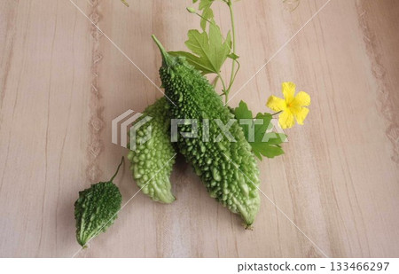 Bitter melon grown in a balcony garden 133466297