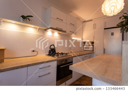 Explore Modern Kitchen Design featuring sleek, stylish elements and an abundance of natural light Explore Modern Kitchen Design featuring sleek, stylish elements and an abundance of natural light 133466443