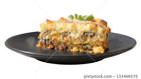 Savory moussaka dish with ground lamb and eggplant layers, topped with rich bechamel sauce. comforting meal 133466578