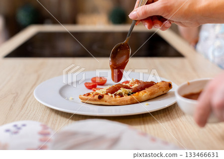 Close view of jam topped waffle, Golden morning waffle adorned with fruity jam scene, Detailed view of sweet breakfast waffle covered with colorful fruity jam topping Close view of jam topped waffle, Golden morning waffle adorned with fruity jam scene, Detailed view of sweet breakfast waffle covered with colorful fruity jam topping 133466631
