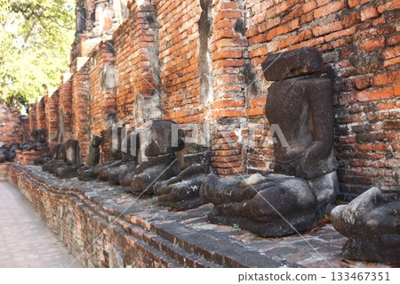 Buddha statue at Wat Mahathat, Ayutthaya Historical Park, Ayutthaya, Thailand Buddha statue at Wat Mahathat, Ayutthaya Historical Park, Ayutthaya, Thailand 133467351