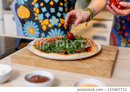 Indulge in the Delightful Preparation of Homemade Pizza Using Only Fresh, Quality Ingredients Indulge in the Delightful Preparation of Homemade Pizza Using Only Fresh, Quality Ingredients 133467712