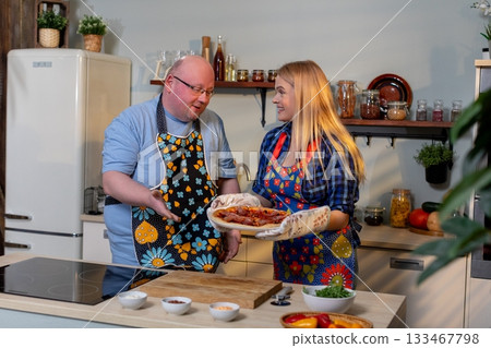 Enjoying Joyful Cooking Moments in a Modern Kitchen That Inspires Creativity and Fun Enjoying Joyful Cooking Moments in a Modern Kitchen That Inspires Creativity and Fun 133467798