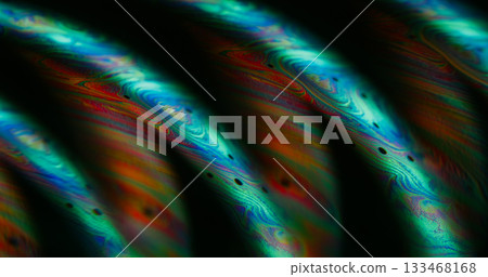 Blur substance spill. Chemical ink. Blue orange purple color bubble black curve emulsion floating on abstract acrylic neon light art background. 133468168