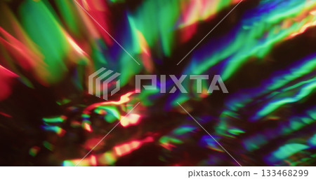 Holographic light blur. Beam prism. Rainbow color twinkle rays stream on black. Gradient neon reflection lens abstract background. 133468299