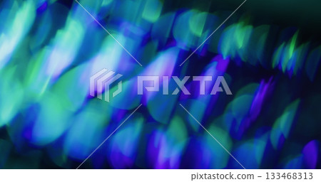 Fluorescent glow blur. Futuristic flare. Purple blue green kaleidoscope sparks on black background. Neon color abstract luminosity. Fluorescent glow blur. Futuristic flare. Purple blue green kaleidoscope sparks on black background. Neon color abstract luminosity. 133468313