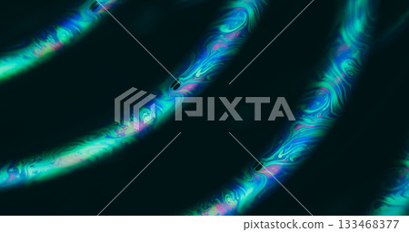 Defocused light fluid. Gasoline emulsion. Green blue purple color ink curve bubble neon rainbow texture floating on abstract dark black background. 133468377