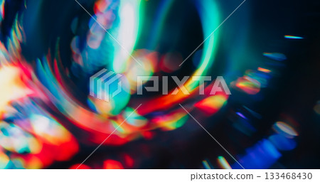 Bokeh crystal glow. Gradient reflection. Fluorescent abstract colorful circle on dark background. Blur holographic neon gleam optic effect. 133468430