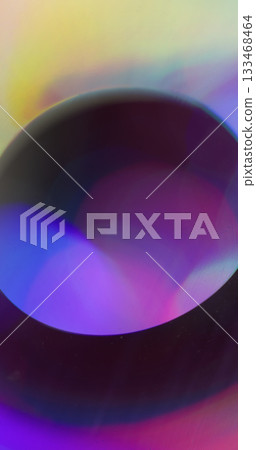 Spectrum blur glow. Circle tunnel. Colorful neon bright prism. Illuminated abstract purple blue yellow bokeh flare on black background. Spectrum blur glow. Circle tunnel. Colorful neon bright prism. Illuminated abstract purple blue yellow bokeh flare on black background. 133468464