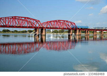 Auspicious train running over the Kinokawa Bridge (Nankai Electric Railway) [Wakayama City, Wakayama Prefecture] 133468469