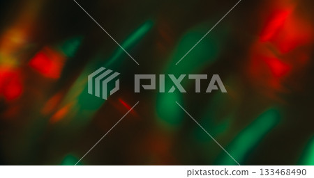 Flash leak blur. Retro flare. Bright green red flame burn film dark black background. Abstract color aged prism luminosity texture. Flash leak blur. Retro flare. Bright green red flame burn film dark black background. Abstract color aged prism luminosity texture. 133468490