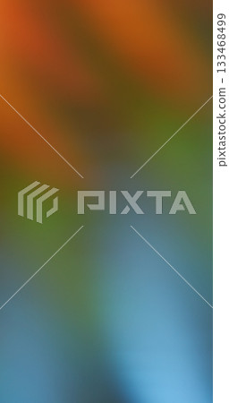 Defocused bright flare. Gradient light. Colorful twinkle texture mixing beam. Optical reflection on red green blue abstract background. 133468499