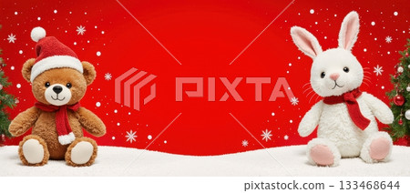 Two plush toys, a teddy bear and a rabbit sit on a snowy surface in front of a red backdrop with snowflakes, capturing a festive, playful holiday mood without human figures 133468644