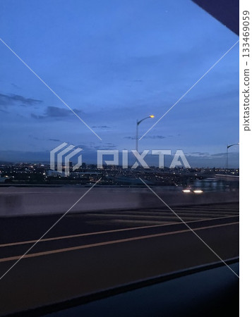 Night view of the city from a car perspective | High-speed road lights and blue-purple skyscape** Night view of the city from a car perspective | High-speed road lights and blue-purple skyscape** 133469059