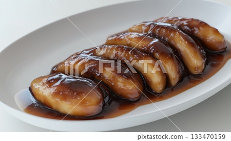 Banana foster with cinnamon and caramel sauce Banana foster with cinnamon and caramel sauce 133470159