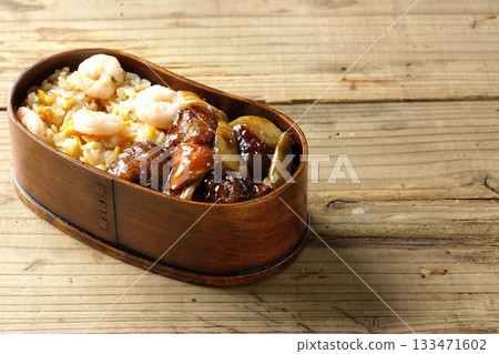Shrimp fried rice and black vinegar sweet and sour pork bento Shrimp fried rice and black vinegar sweet and sour pork bento 133471602