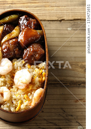 Shrimp fried rice and black vinegar sweet and sour pork bento Shrimp fried rice and black vinegar sweet and sour pork bento 133471651