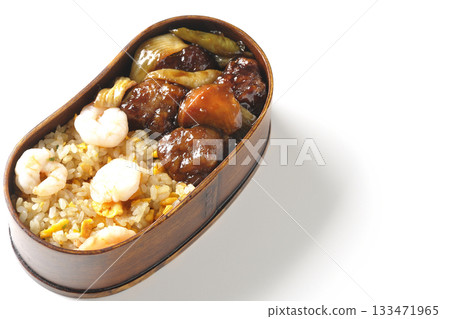 Shrimp fried rice and black vinegar sweet and sour pork bento photographed on a white background Shrimp fried rice and black vinegar sweet and sour pork bento photographed on a white background 133471965