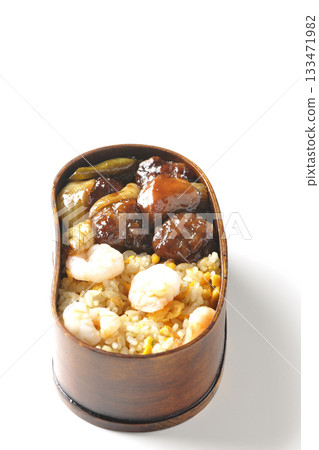 Shrimp fried rice and black vinegar sweet and sour pork bento photographed on a white background Shrimp fried rice and black vinegar sweet and sour pork bento photographed on a white background 133471982