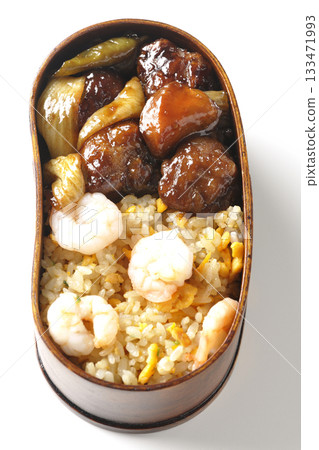 Shrimp fried rice and black vinegar sweet and sour pork bento photographed on a white background Shrimp fried rice and black vinegar sweet and sour pork bento photographed on a white background 133471993