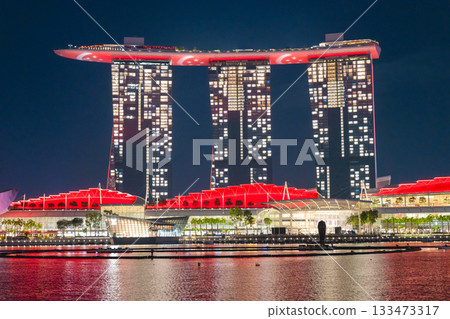 Marina Bay Sands, Singapore lit up in the red colours of the national flag on National Day Marina Bay Sands, Singapore lit up in the red colours of the national flag on National Day 133473317