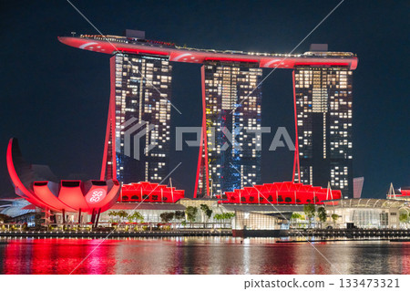 Marina Bay Sands, Singapore lit up in the red colours of the national flag on National Day 133473321