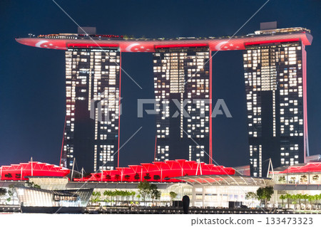 Marina Bay Sands, Singapore lit up in the red colours of the national flag on National Day Marina Bay Sands, Singapore lit up in the red colours of the national flag on National Day 133473323