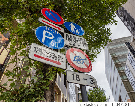 Road signs in Ginza, Tokyo: Regulatory sign 308 "No entry for light vehicles other than bicycles" (with a picture of a large cart) Road signs in Ginza, Tokyo: Regulatory sign 308 "No entry for light vehicles other than bicycles" (with a picture of a large cart) 133473813