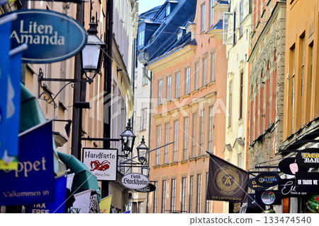 Shop signs on Västerlånggatan Street 133474540