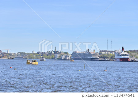 Cruise ship moored on Lake Malaren in the old town Gamla Stan 133474541