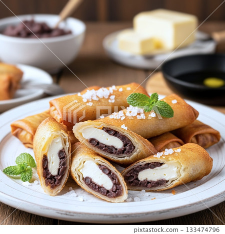 Sweet and salty spring rolls filled with bean paste and butter 133474796