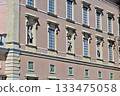 Statues decorating the windows of the Royal Palace in Stockholm 133475058