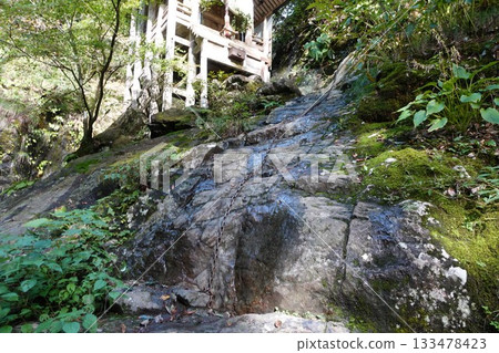 Amanoiwato Shrine: The shrine building stands on a rocky outcrop and is accessed by chains 133478423