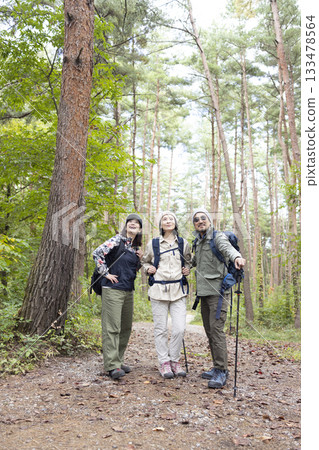 Family enjoying mountain hiking Family enjoying mountain hiking 133478564