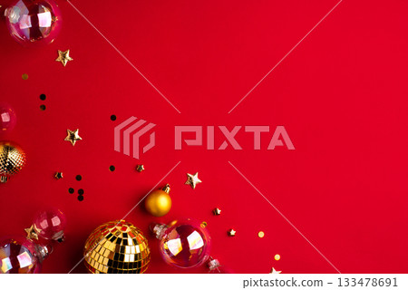 Festive Christmas ornaments on a red background. Festive Christmas ornaments on a red background. 133478691